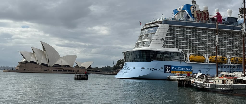 Royal Caribbean Quantum of the Seas docked in Sydney with Sydney Opera House in the background