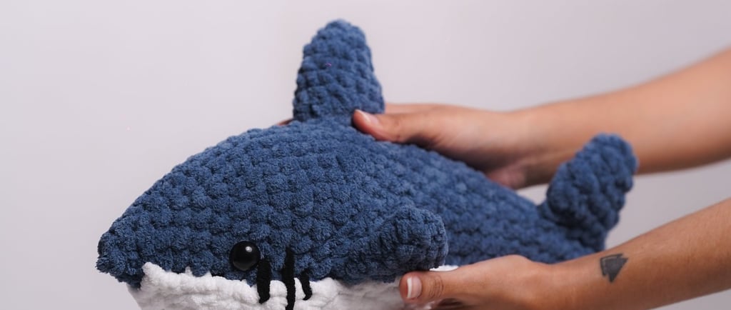 chonky shark plushie from Munnsense Gift Shop