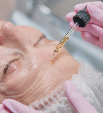 a woman is getting a facelift