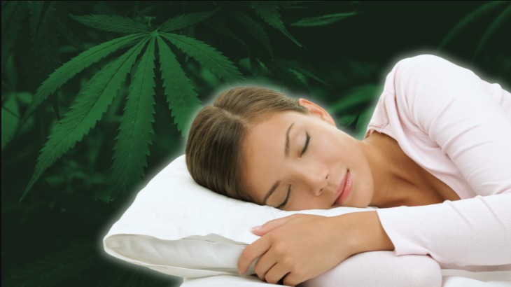 a woman is sleeping on a pillow with a marijuana leaf