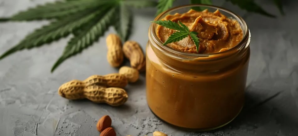 a jar of peanut butter with peanuts