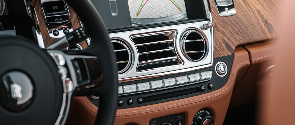 car dashboard with many buttons