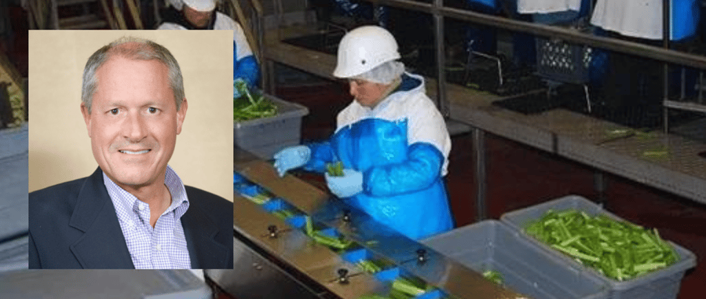 a man named Rick Alcocer, SVP of Sales and Marketing, Duda Farm Fresh Foods and a woman in a suit