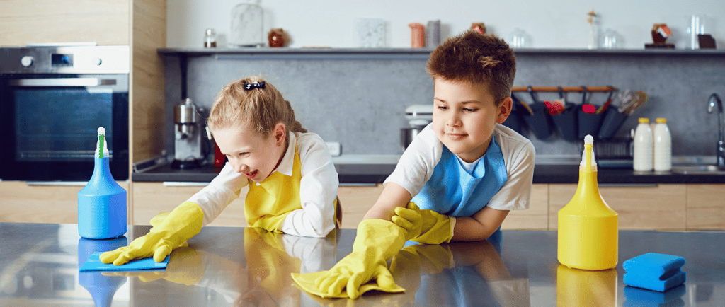 Kids helping clean the kitchen