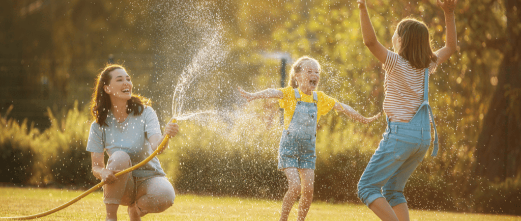 Playing in water on the common green