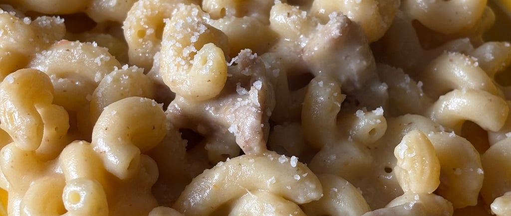 Riccioli con crema di patate e salsiccia