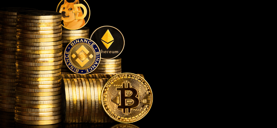 a stack of coins with a bitcoin coin on top of it