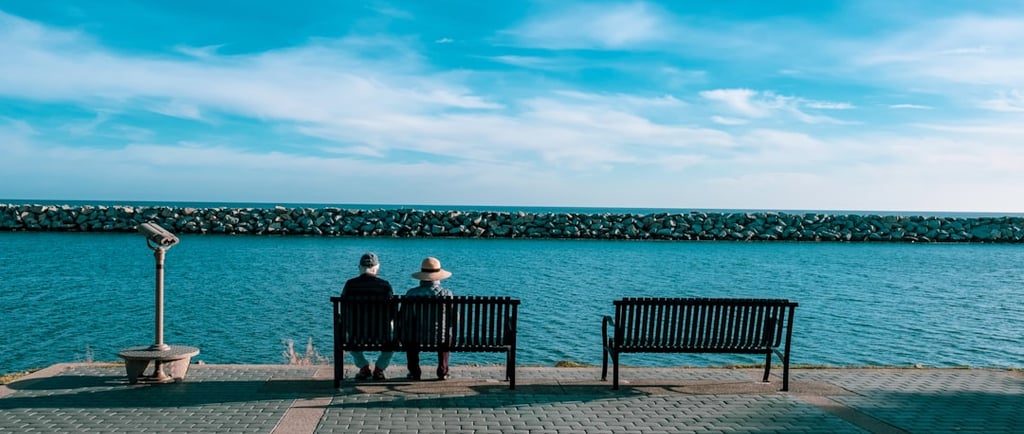 Couple on a Bench Staring Over Water