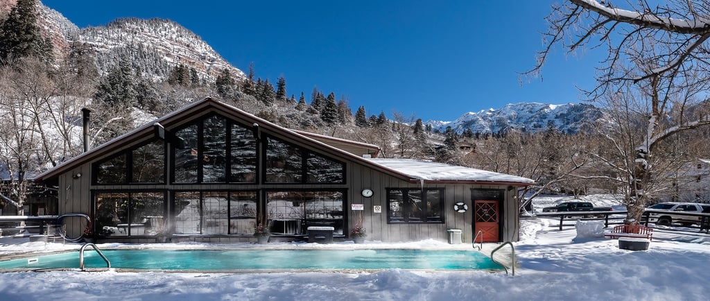 Ouray, CO real estate commercial property branding historic hotel and outdoor pool winter day