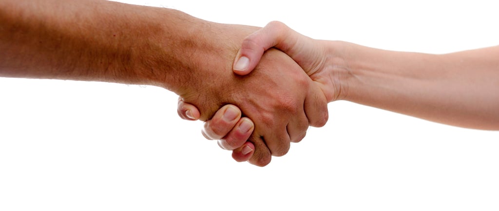 a man and woman shaking hands