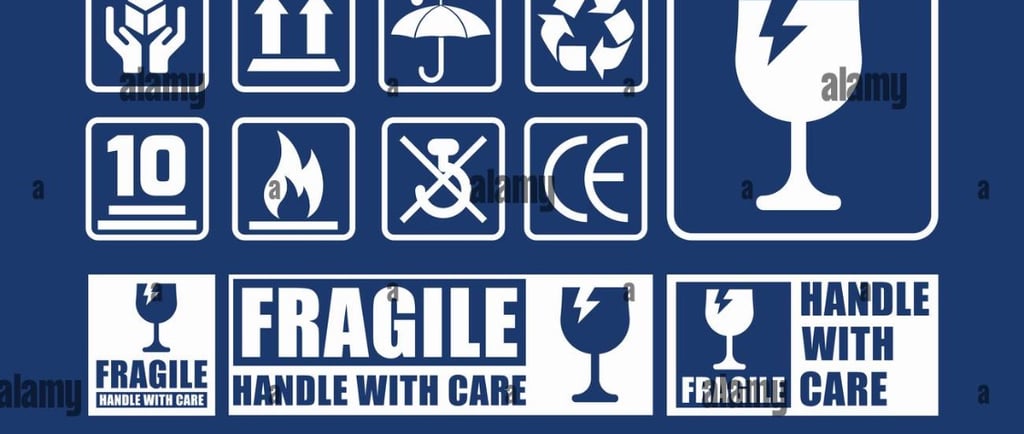 Signs saying Fragile, Handel with Care