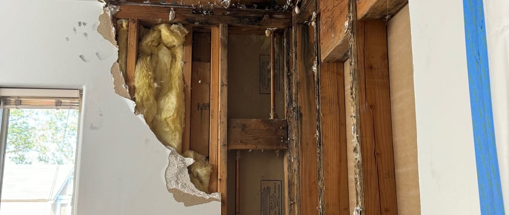 Roof leak damage. Repaired roof and drywall. Water damage.