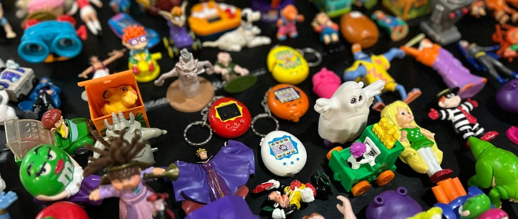 Collectable toys on a black table