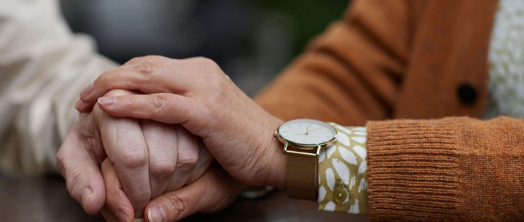two people holding hands