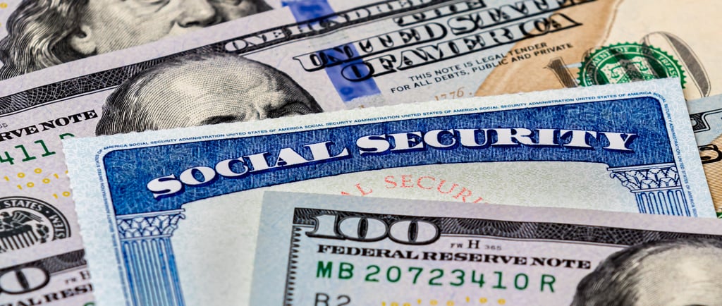 a hundred dollar bill and social security card for social security benefits