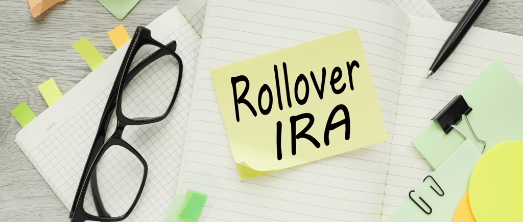 glasses and sticky notes for performing rollover to roth ira