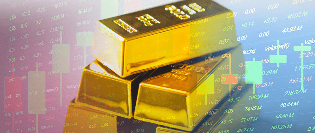 gold bullion bars in a pile with candlesticks and chart data