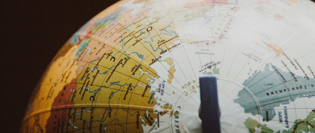 globe showing different countries and nations representing Gold IRA and geopolitical risk