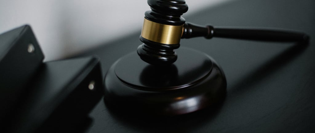 a gavel on a desk showing gold ira regulations and compliance