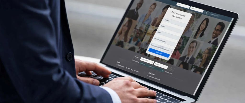A businessman on a laptop completing an online registration form for LinkedIn