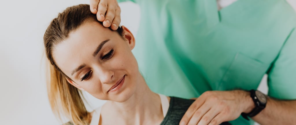 a woman having neck pain due to arthritis