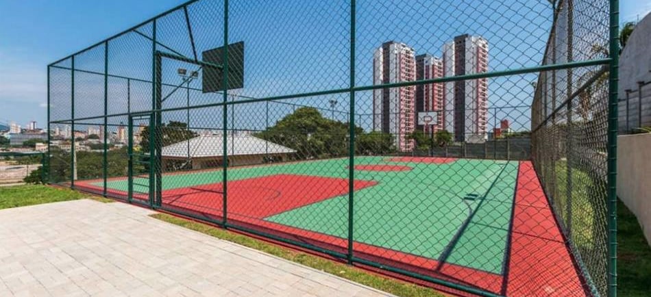 a tennis court with a basketball hoop net and a basketball hoop