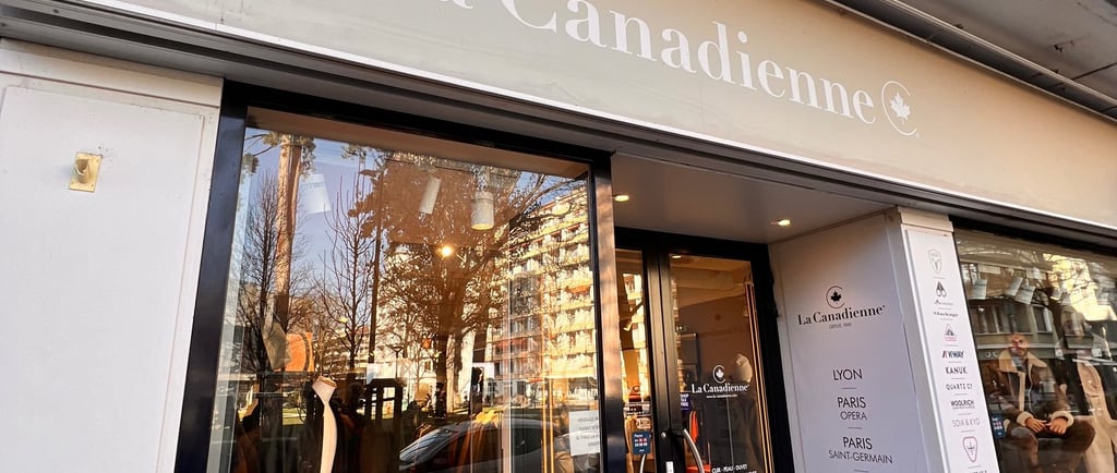 a storefront door with a large window and a sign that says la canada