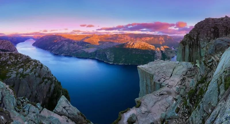 a mountain view of a lake and mountains