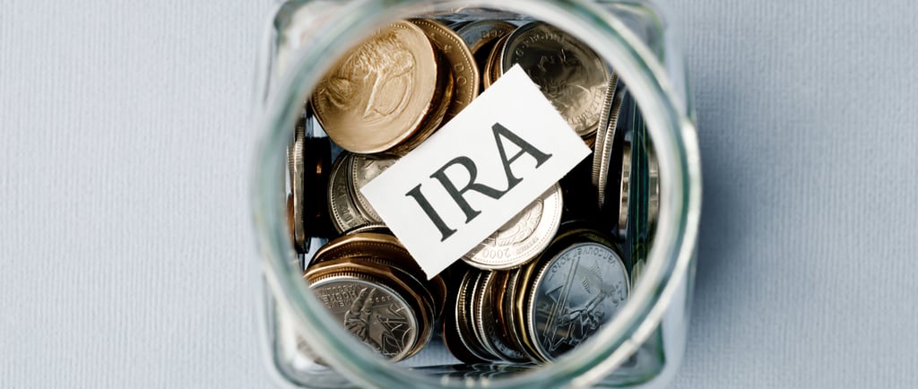 coins in a jar for an individual retirement account