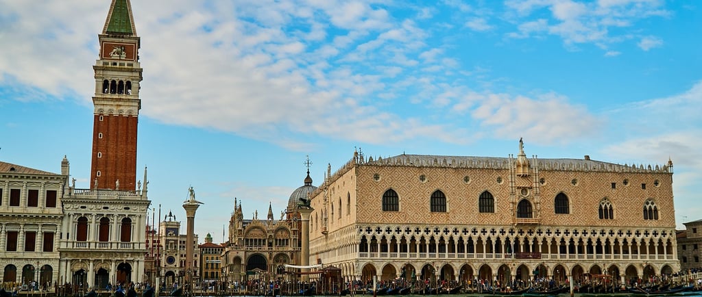a large building with a clock tower in the middle of it