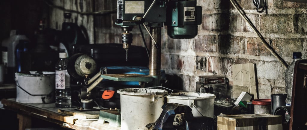 Garage with tools, bottles, pots