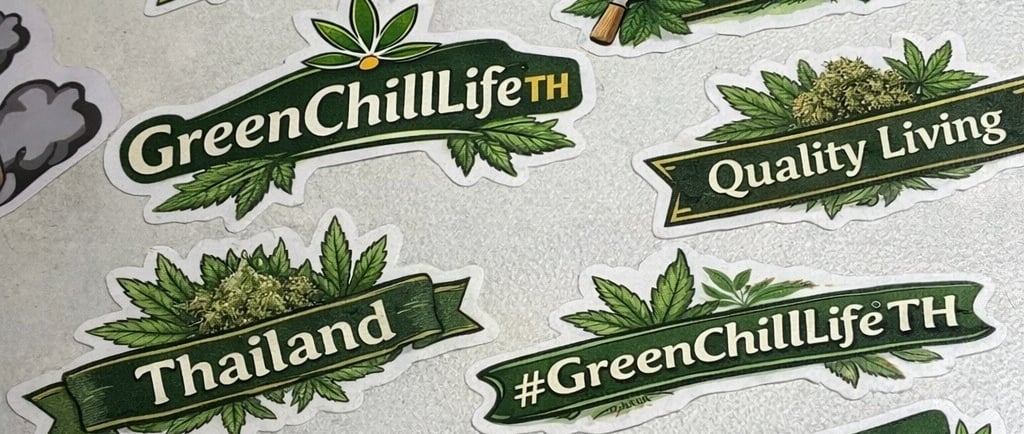 a bunch of stickers that are on a table for the greenchill life thailand