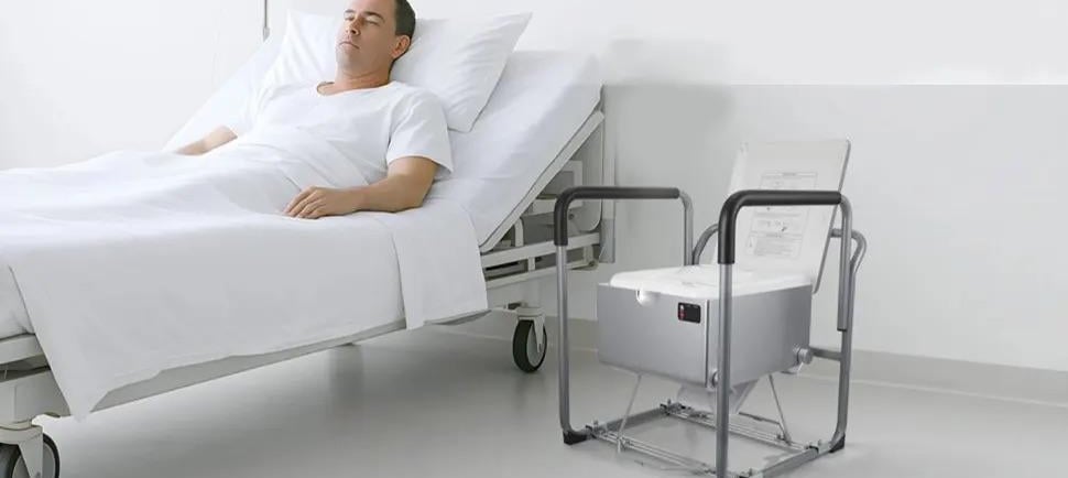 Dry Flush Toilet for Seniors, in the bedroom next to bed.