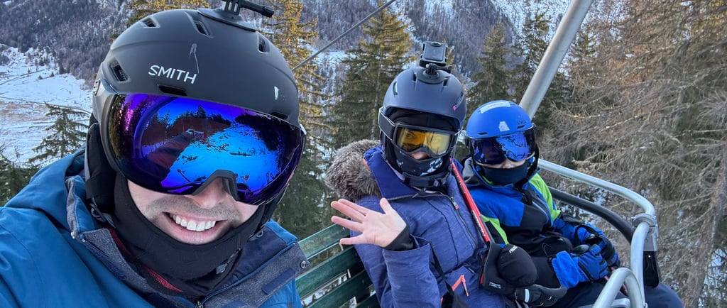 family on a chair lift in la thuile