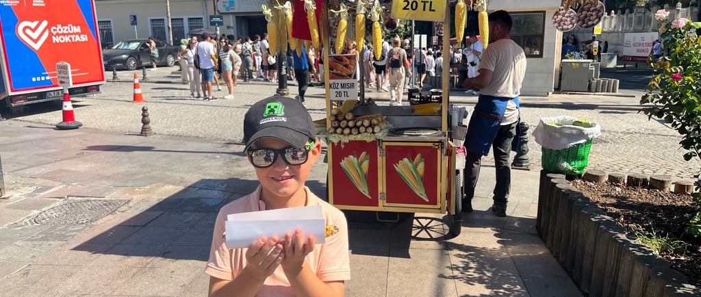 Kid buying Turkish street food 