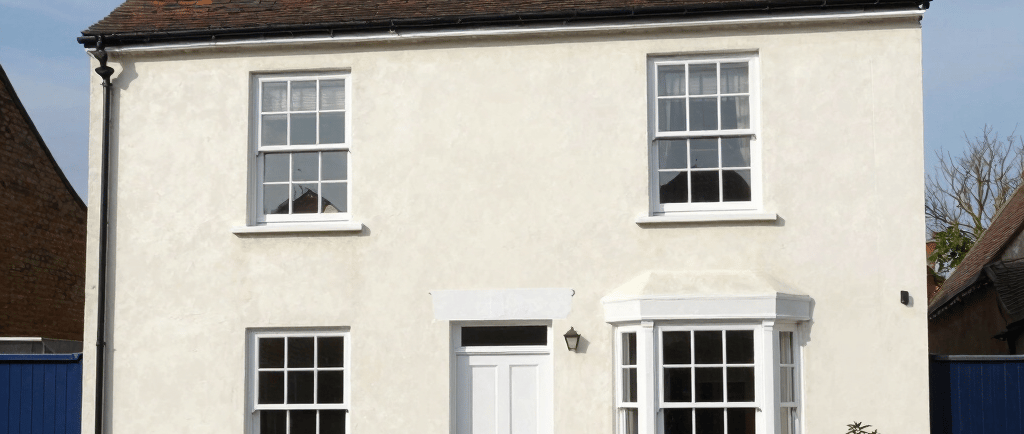 Child walks through a space-themed playground tunnel at play area
