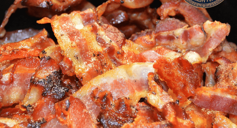 a high pile of crispy fried cambodia premium bacon 