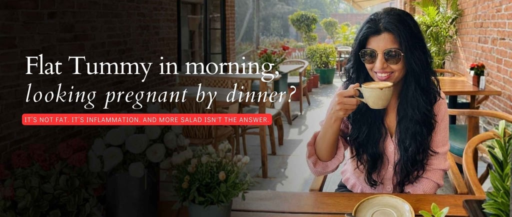 Woman drinking warm herbal tea to relieve evening bloating and improve gut health naturally