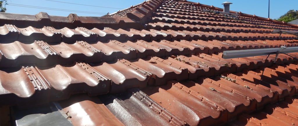 Building maintenance on Perth tiled roof