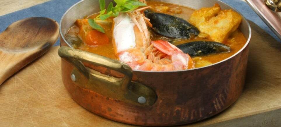 Marseille food specialties bouillabaisse and local cuisine at seaside restaurant