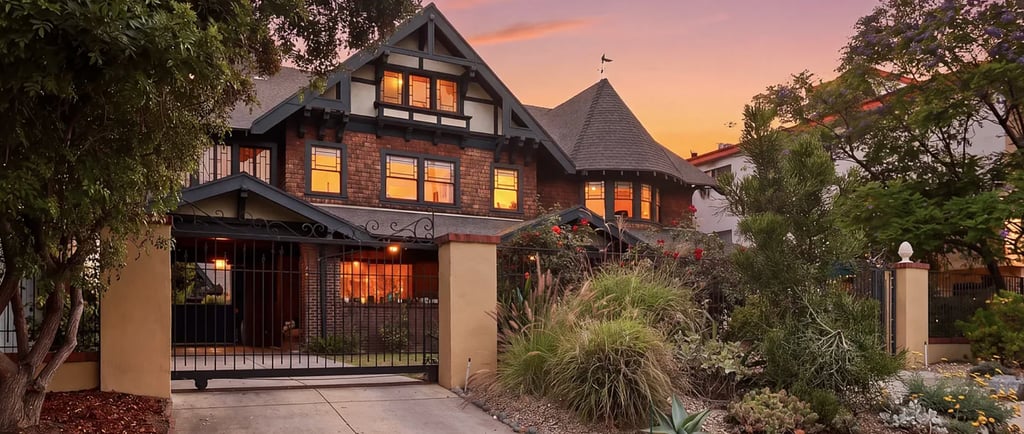 Three-story 1906 Craftsman house at 1415 South Manhattan Place in the Angelus Vista neighborhood.