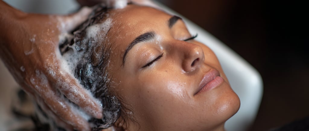 Woman getting her scalp massaged