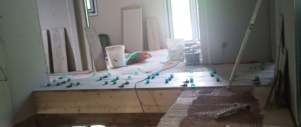 a room with a lot of wood flooring and a flooring area