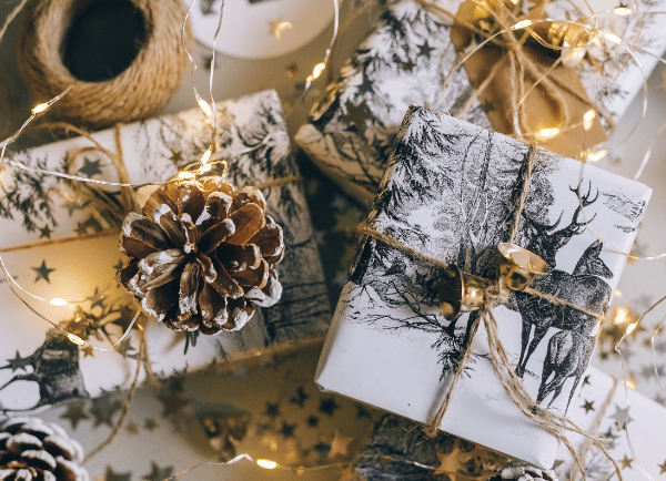 gift boxes wih white paper and lights