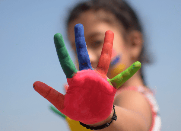 a hand with multi color on it