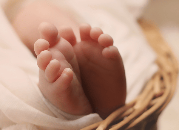 a baby toes in basket