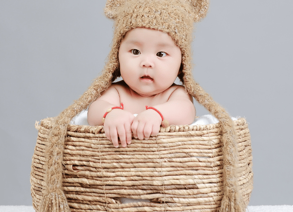 a baby in basket 