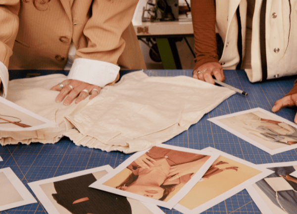 women doing some cutting for outfits 