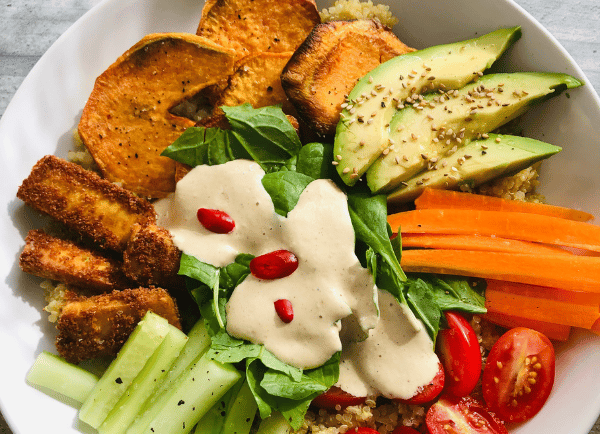 a salad bowl on the table 