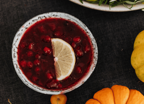 cranberry sauce with some fruits on the table